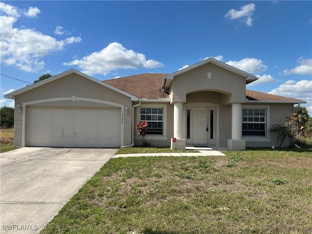 ranch-style house with a garage and a front lawn