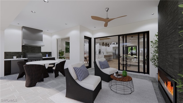 living room with ceiling fan