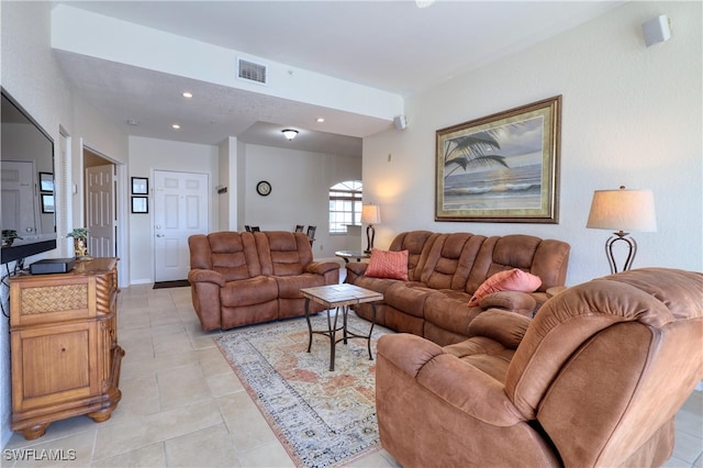 living room featuring light tile patterned flooring