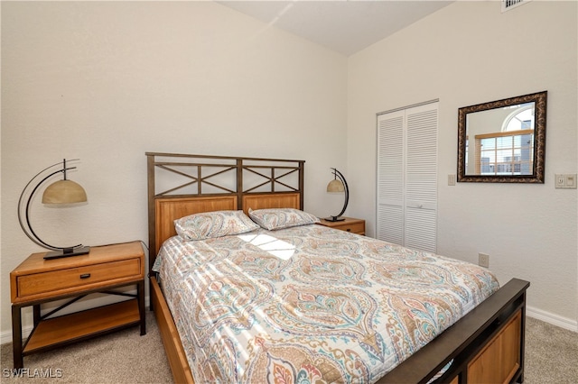 carpeted bedroom with a closet