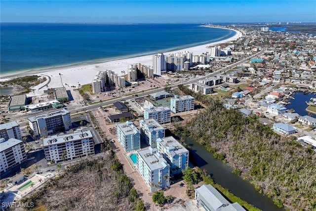 aerial view featuring a view of the beach and a water view