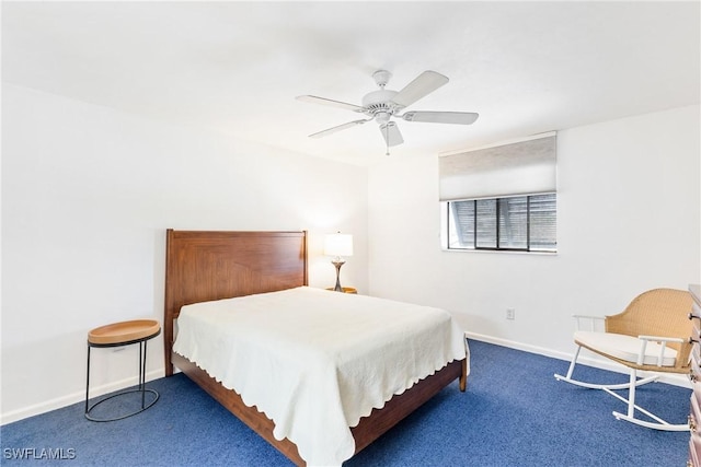 bedroom featuring dark colored carpet and ceiling fan