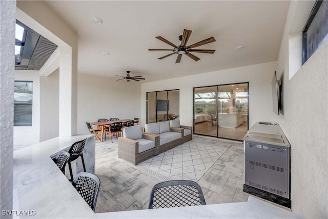 interior space featuring ceiling fan