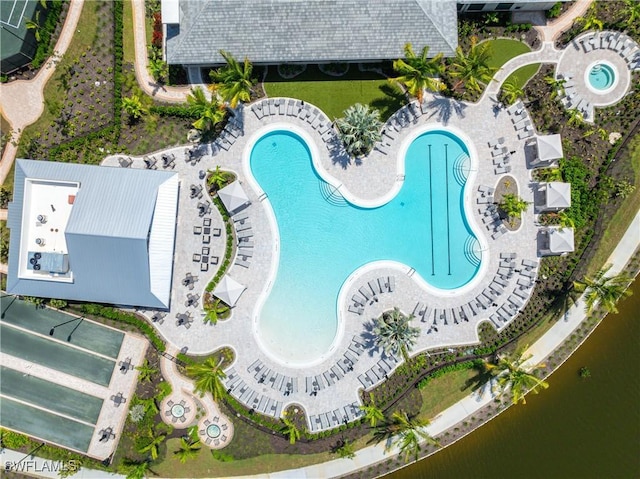 birds eye view of property featuring a water view