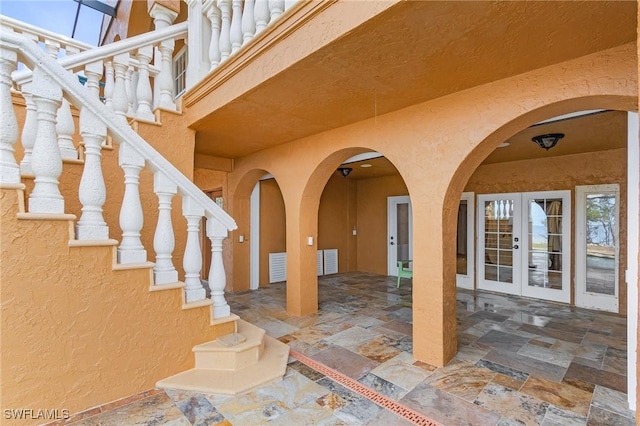 view of patio featuring french doors