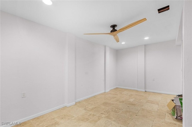 unfurnished room with ceiling fan