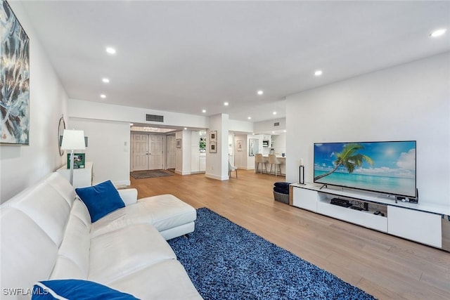 living room featuring light wood-type flooring