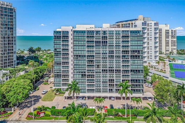 view of building exterior featuring a water view