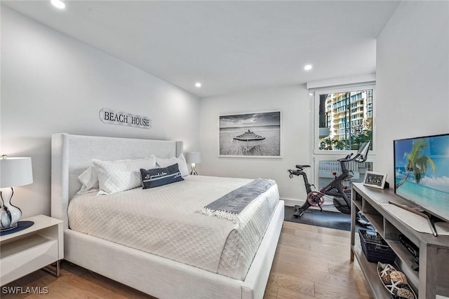 bedroom with light hardwood / wood-style floors