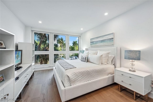 bedroom with wood-type flooring