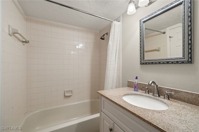 bathroom with shower / bath combo with shower curtain and vanity