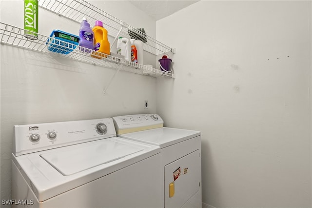 laundry area featuring separate washer and dryer