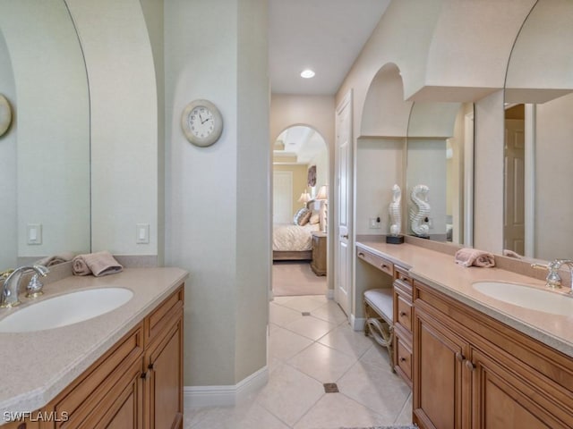 bathroom featuring tile patterned floors and vanity