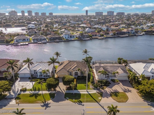 drone / aerial view with a water view