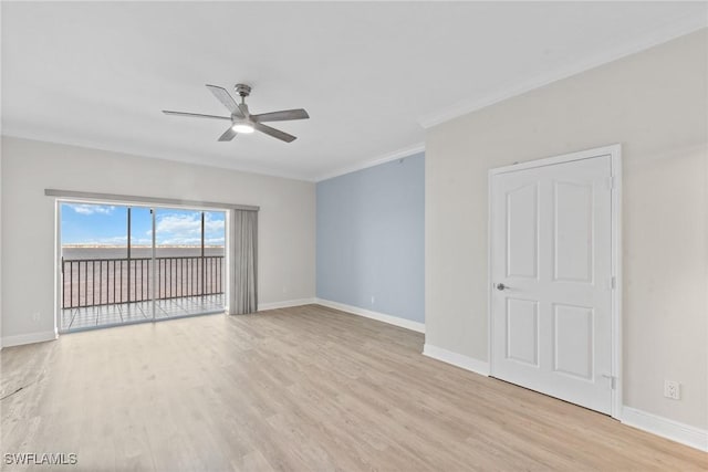 unfurnished room featuring ceiling fan, light hardwood / wood-style flooring, and ornamental molding