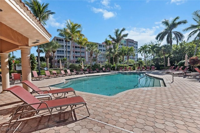 view of pool featuring a patio area