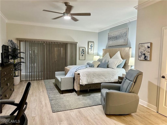 bedroom featuring ceiling fan, light hardwood / wood-style floors, and crown molding