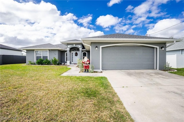 single story home featuring a garage and a front lawn