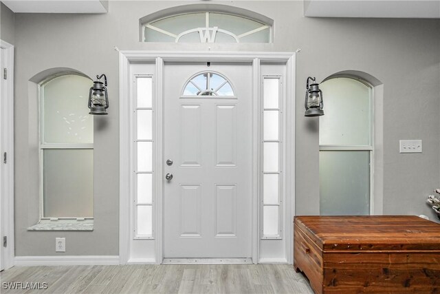 foyer with light wood-type flooring