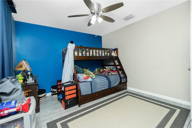 bedroom featuring ceiling fan and light wood-type flooring