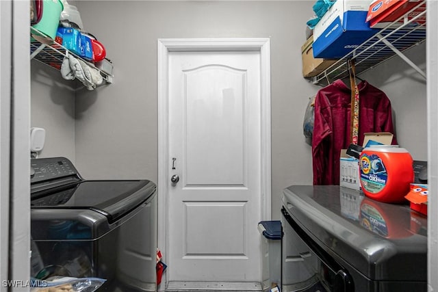 laundry room with washer and dryer