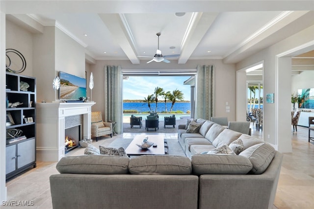 living room featuring beamed ceiling, ceiling fan, and crown molding