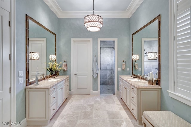 bathroom featuring a shower with door, vanity, and ornamental molding