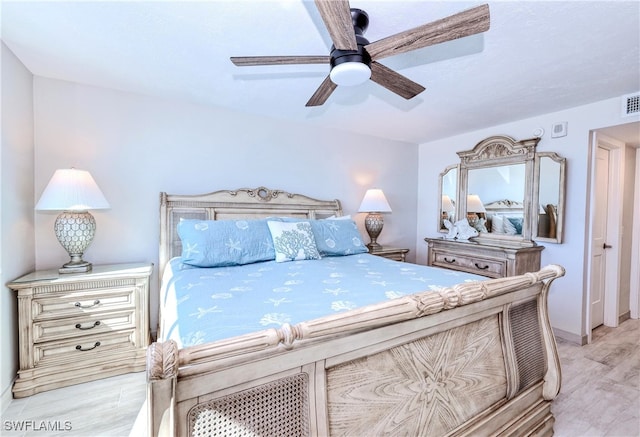 bedroom featuring ceiling fan and light wood-type flooring