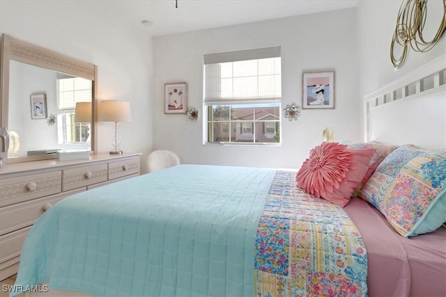 bedroom featuring multiple windows