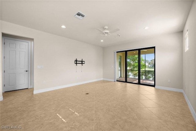 empty room with light tile patterned flooring, recessed lighting, a ceiling fan, visible vents, and baseboards