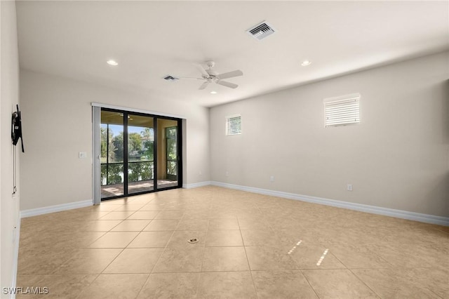 unfurnished room featuring recessed lighting, visible vents, a ceiling fan, light tile patterned flooring, and baseboards