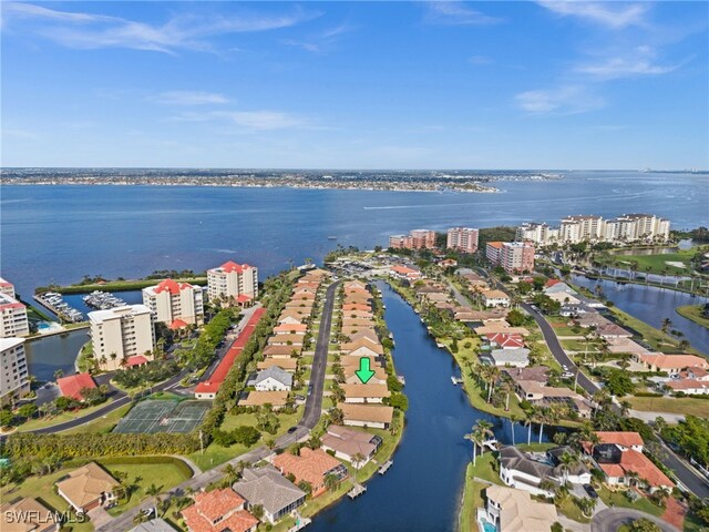 bird's eye view with a water view