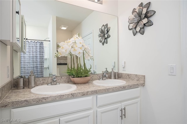 bathroom featuring vanity and walk in shower