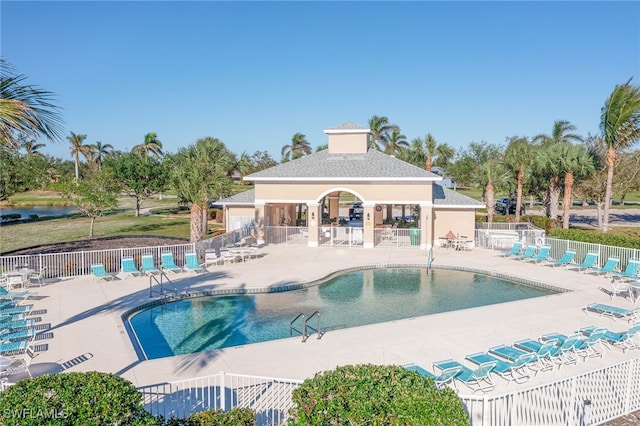 view of pool featuring a patio