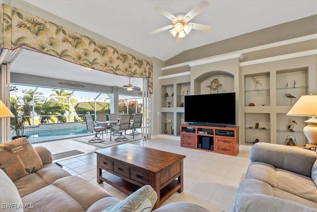 tiled living room with lofted ceiling, ceiling fan, and built in features