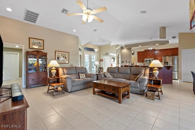 living room with ceiling fan, french doors, and light tile patterned floors