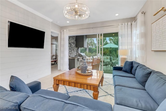 tiled living room with a chandelier