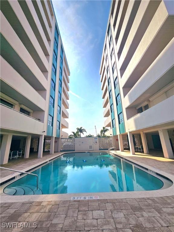 view of pool featuring a patio area