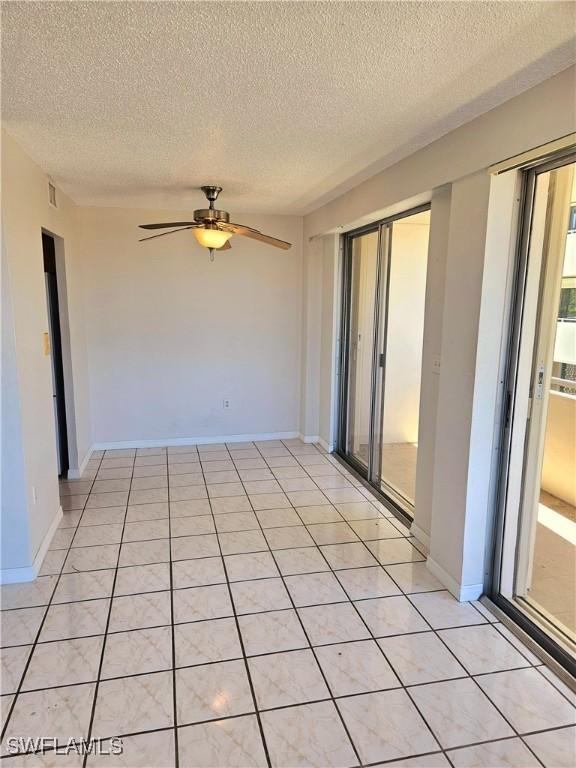 interior space featuring ceiling fan