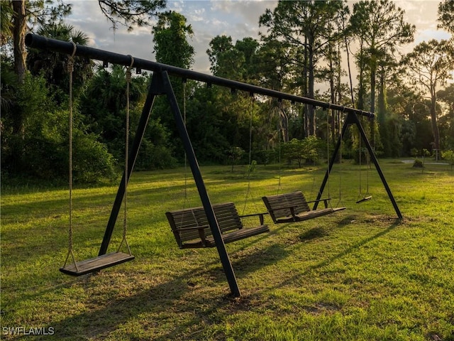 view of jungle gym with a yard