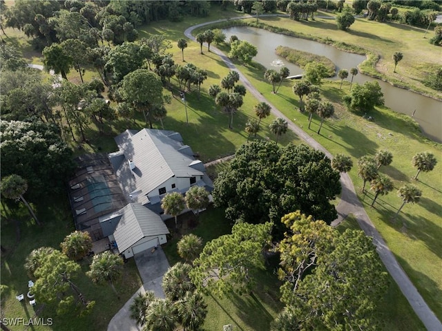 drone / aerial view with a water view