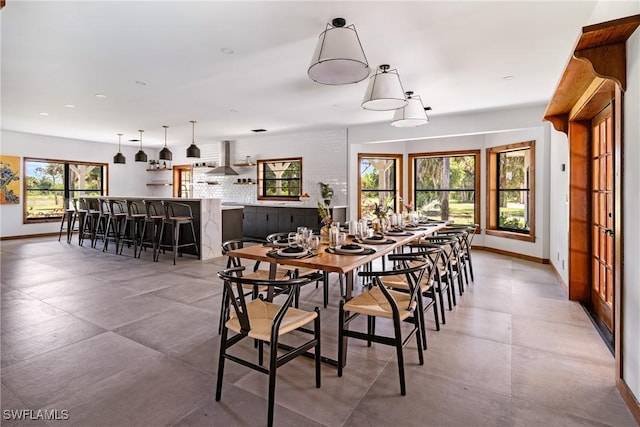 dining room with baseboards