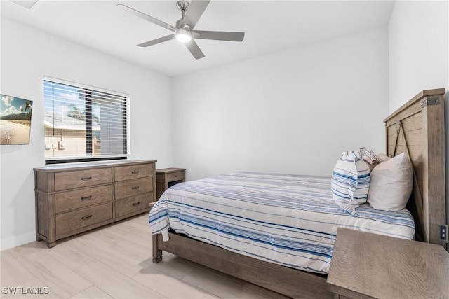 bedroom featuring ceiling fan and light wood-type flooring