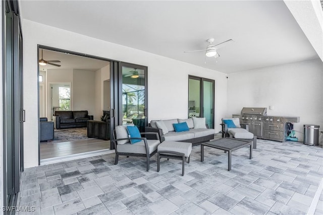 view of patio featuring area for grilling and an outdoor hangout area