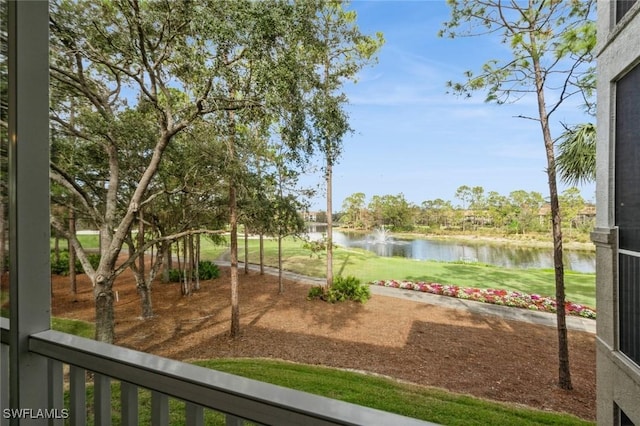 view of yard with a water view