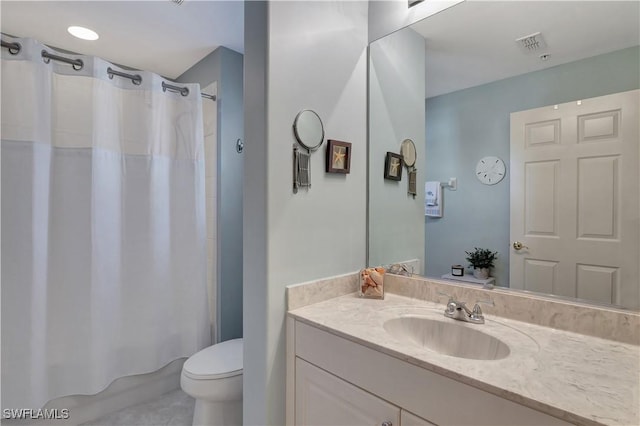 full bathroom with vanity, shower / bath combination with curtain, and toilet