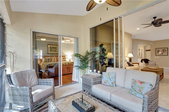 living room featuring ceiling fan