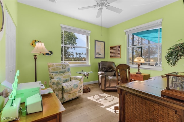 office area featuring ceiling fan and light hardwood / wood-style floors