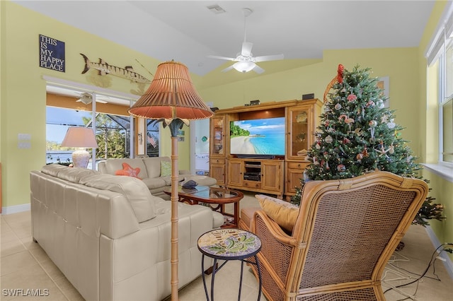 living room featuring ceiling fan and light tile patterned flooring