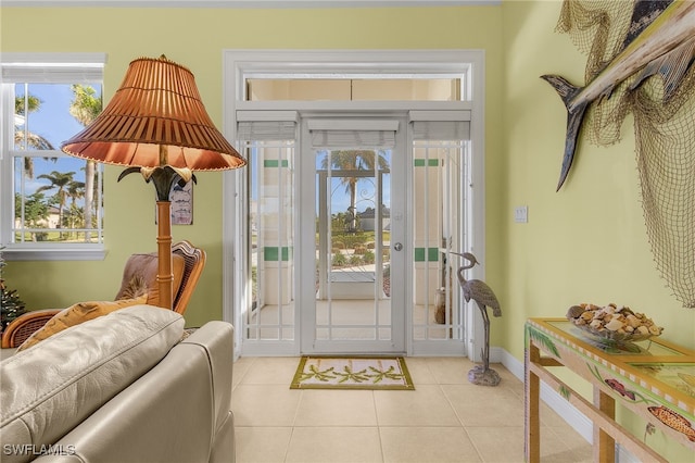 entrance foyer with a wealth of natural light and light tile patterned floors